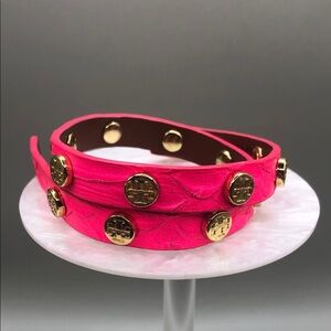 Tory Burch hot bright pink snakeskin look double wrap logo studded bracelet.